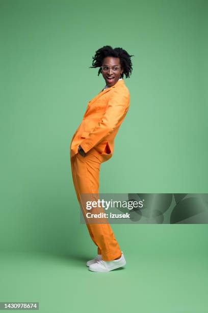 portrait of confident elegant man - fashion orange colour stock pictures, royalty-free photos & images