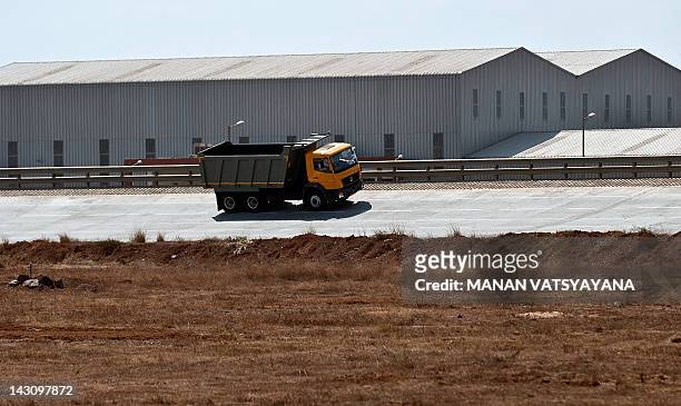 Bharat Benz truck is driven on a test track at the Daimler India Commercial Vehicles Plant at Oragadam in Chennai on April 18, 2012. The German...