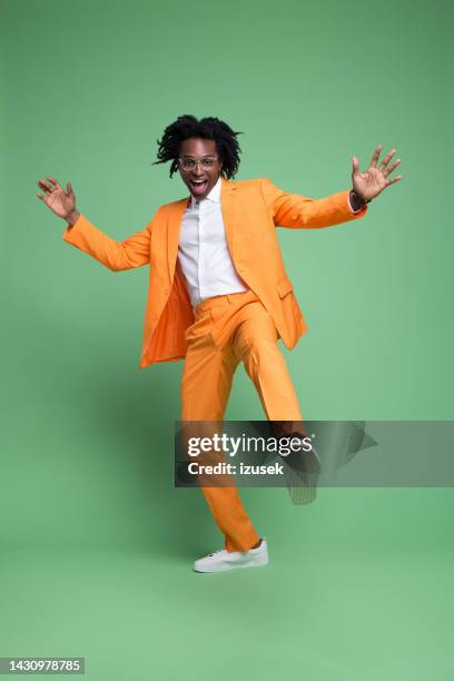 portrait of excited elegant man - green shirt stock pictures, royalty-free photos & images