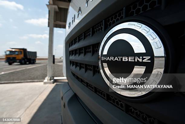 Bharat Benz logo is seen as a Bharatbenz truck is driven on a test track at the Daimler India Commercial Vehicles Plant at Oragadam in Chennai on...
