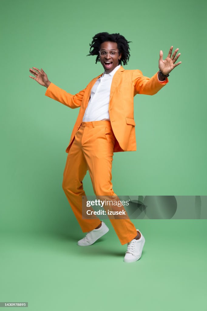 Portrait of excited elegant man