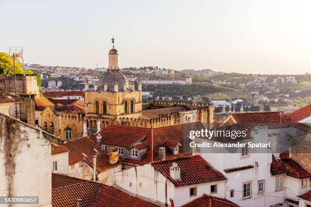 coimbra city skyline with tower of the old cathedral of coimbra, portugal - coimbra district stock-fotos und bilder
