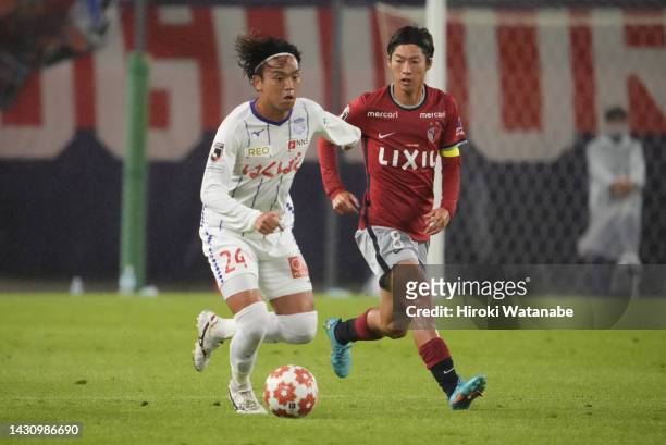 Shoma Doi of Kashima Antlers and Riku Yamada of Ventforet Kofu compete for the ball during the 102nd Emperor's Cup semi final between Ventforet Kofu...