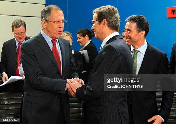 German Foreign minister Guido Westerwelle welcomes Russian Foreign Minister Sergei Lavrov and NATO Secretary General Anders Fogh Rasmussen before a...
