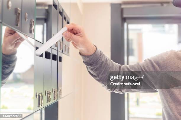 mail deliver in mailbox - mailbox stock pictures, royalty-free photos & images