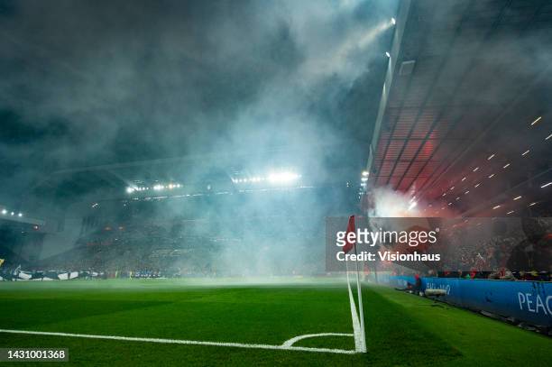Smoke filled Anfield Stadium after Rangers FC fans set off flares before the UEFA Champions League group A match between Liverpool FC and Rangers FC...