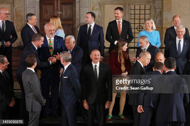 Leaders of nations of the European Political Community , including Azerbaijan President Ilham Aliyev , arrive for a group photo during the inaugural...