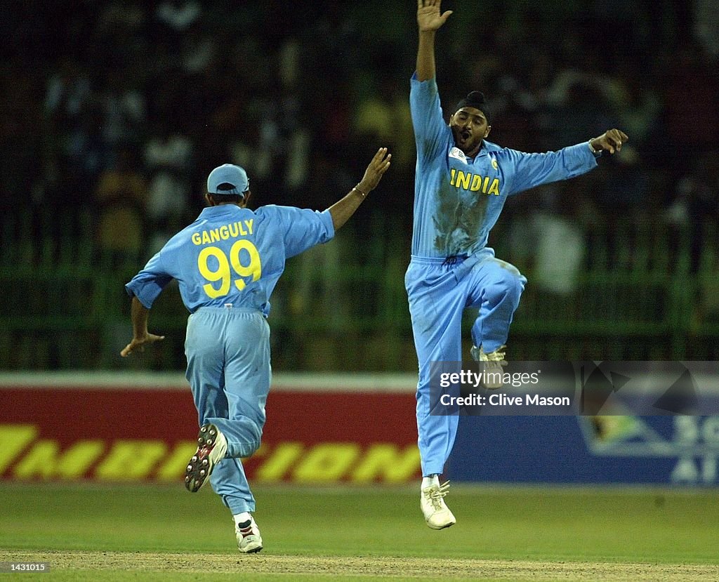 Harbahjan Singh of India celebrates dismissing Jonty Rhodes of South Africa