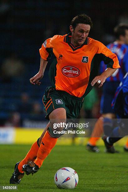 Lee Hodges of Plymouth Argyle runs with the ball during the Worthington Cup first round match between Crystal Palace and Plymouth Argyle played at...