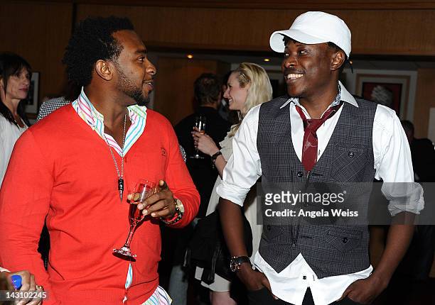 Actor Enyinna Nwigwe and director Jeta Amata attend the 'Black November' screening on April 18, 2012 in Beverly Hills, California.