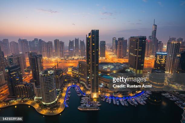 An Aerial View of the Dubai marina Skyline at misty Sunrise taken on in Dubai, United Arab Emirates