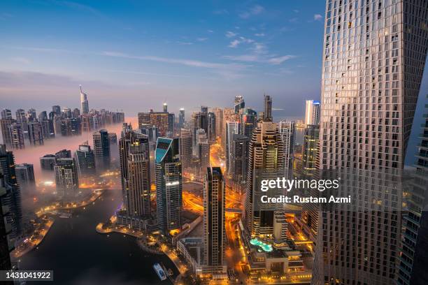 An Aerial View of the Dubai Skyline during Foggy Morning taken on in Dubai, United Arab Emirates