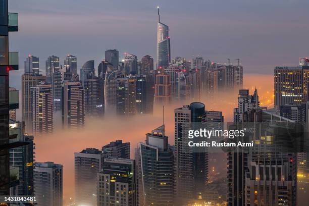 An Aerial View of the Dubai Skyline during Foggy Morning taken on in Dubai, United Arab Emirates