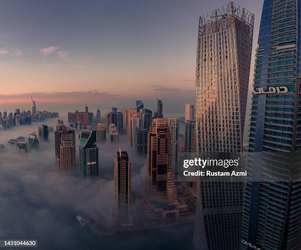 An Aerial View of the Dubai Skyline during Foggy Morning taken on in Dubai, United Arab Emirates