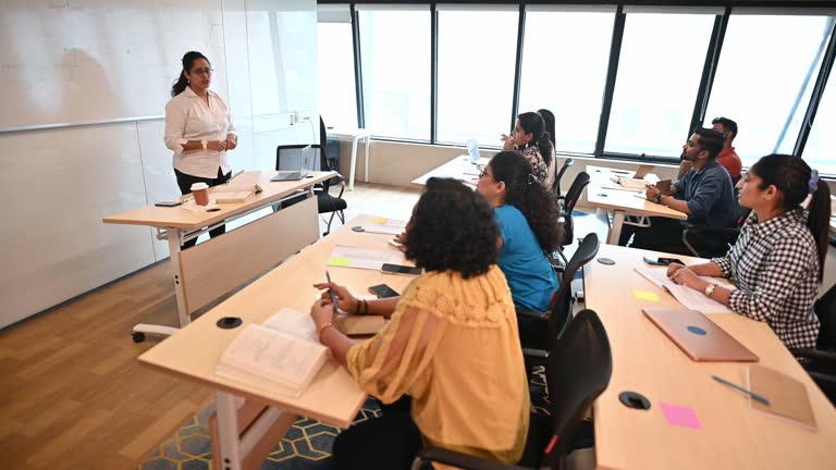 https://media.gettyimages.com/id/1431046078/video/female-instructor-teaching-mature-adult-students-in-the-classroom.jpg?b=1&s=640x640&k=20&c=LI5TClZqMmRbDVNKN-NSsh_cGM6Q9ou4Z9Xb0G46Hmk=