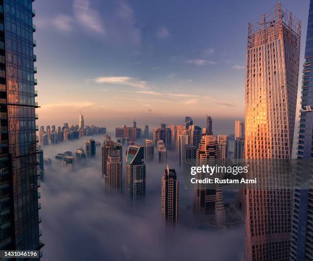 An Aerial View of the Dubai Skyline during Foggy Morning taken on in Dubai, United Arab Emirates