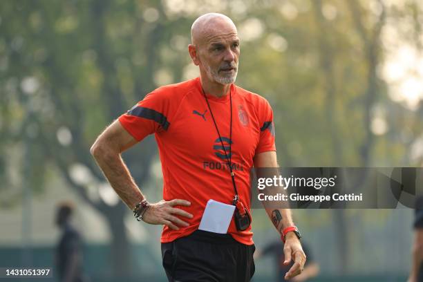 Stefano Pioli Head coach of AC Milan looks on during an AC Milan training session at Milanello on October 06, 2022 in Milan, Italy.