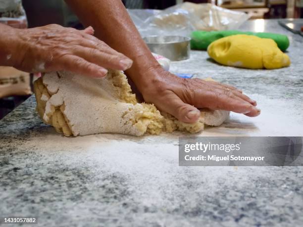 preparing a marzipan dessert in a bakery - marzipan stock-fotos und bilder
