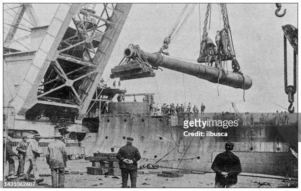stockillustraties, clipart, cartoons en iconen met antique image: installation of gun cannon on battle ship "bouvet" in lorient - marine engineering