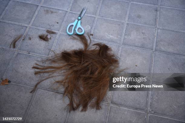 Hair cut at a rally against the death of two Iranian women, in front of the Iranian embassy, on October 6 in Madrid, Spain. This rally has been...