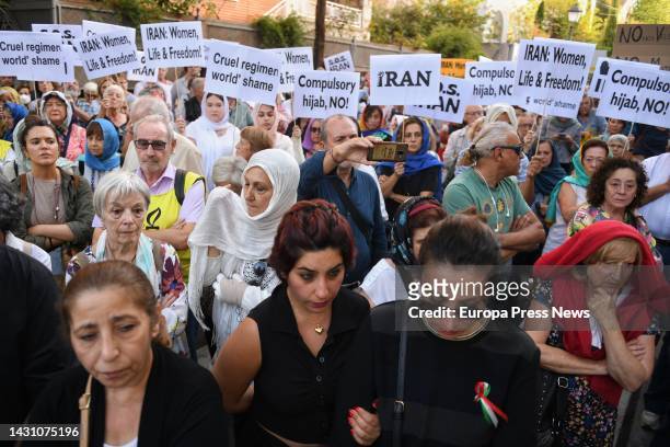 Several people at a rally against the death of two Iranian women, in front of the Iranian embassy, on October 6 in Madrid, Spain. This rally was...
