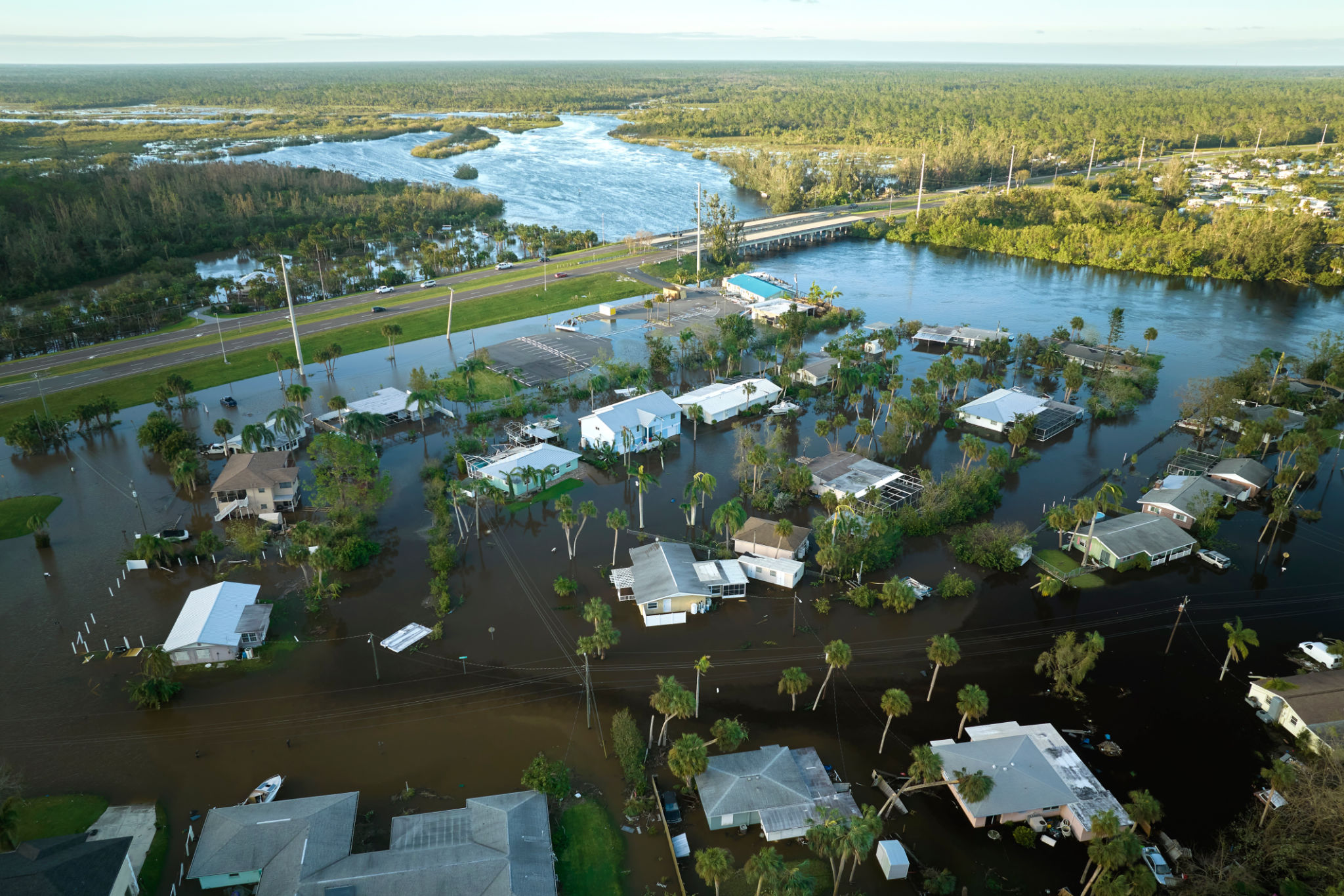 Hurricane Ian flooded houses in Florida residential area. Natural disaster and its consequences Hurricane Ian flooded houses in Florida residential area. Natural disaster and its consequences
