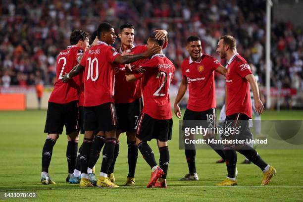 Anthony Martial of Manchester United celebrates with teammates after scoring their team's second goal during the UEFA Europa League group E match...