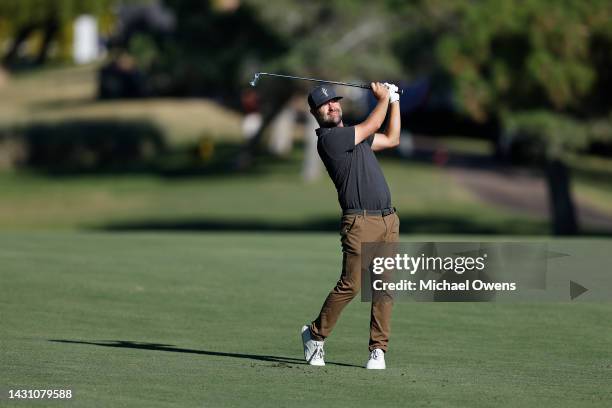 Ryan Moore of the United States hits his second shot on the first hole during the first round of the Shriners Children's Open at TPC Summerlin on...