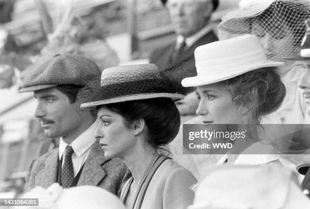 Actresses Marie-France Pisier and Brigitte Fossey and actor Timothy Dalton