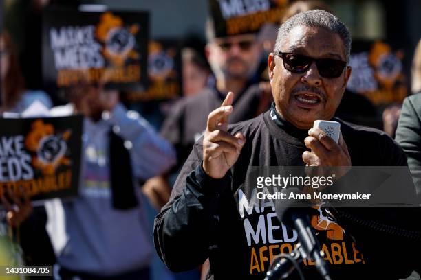 Arthur Blair, an activist with Spaces in Action, speaks during a protest on the price of prescription drug costs in front of the U.S. Department of...