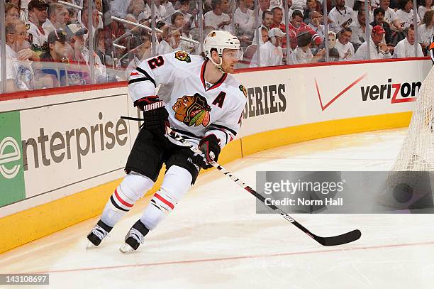 Duncan Keith of the Chicago Blackhawks skates with the puck against the Phoenix Coyotes in Game One of the Western Conference Quarterfinals during...