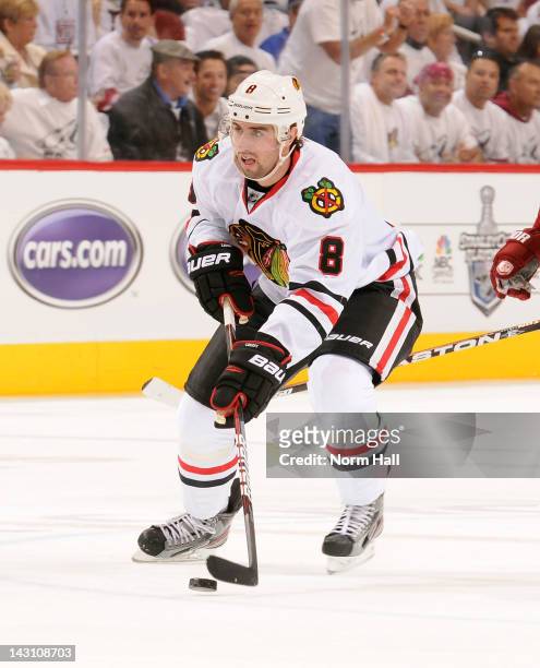 Nick Leddy of the Chicago Blackhawks skates with the puck against the Phoenix Coyotes in Game One of the Western Conference Quarterfinals during the...