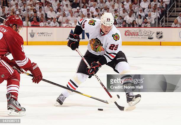 Bryan Bickell of the Chicago Blackhawks skates with the puck against the Phoenix Coyotes in Game One of the Western Conference Quarterfinals during...