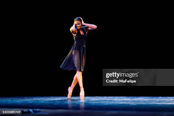 black teenager girl dancing neo-classic ballet on stage - growing pains show stock pictures, royalty-free photos & images