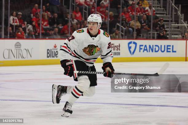 Lukas Reichel of the Chicago Blackhawks skates against the Detroit Red Wings at Little Caesars Arena on September 28, 2022 in Detroit, Michigan.