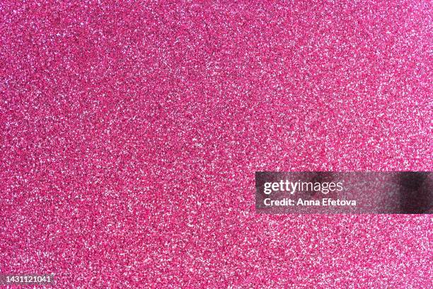 festive pink glittering background. new year and christmas celebration concept. bright backdrop for your design with copy space - sequin stock-fotos und bilder