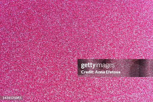 Festive pink glittering background. New Year and Christmas celebration concept. Bright backdrop for your design with copy space Festive pink glittering background. New Year and Christmas celebration concept. Bright backdrop for your design with copy space