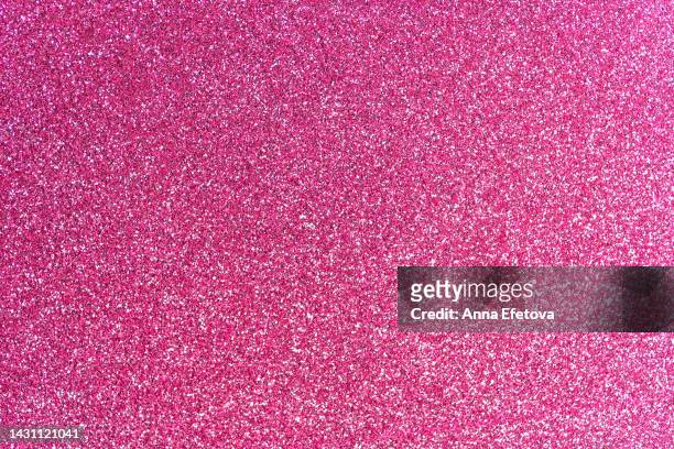 festive pink glittering background. new year and christmas celebration concept. bright backdrop for your design with copy space - glittering ストックフォトと画像