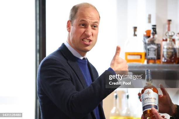 Prince William, Prince of Wales makes a cocktail as he visits the Trademarket outdoor market, as part of the royal visit to Northern Ireland on...