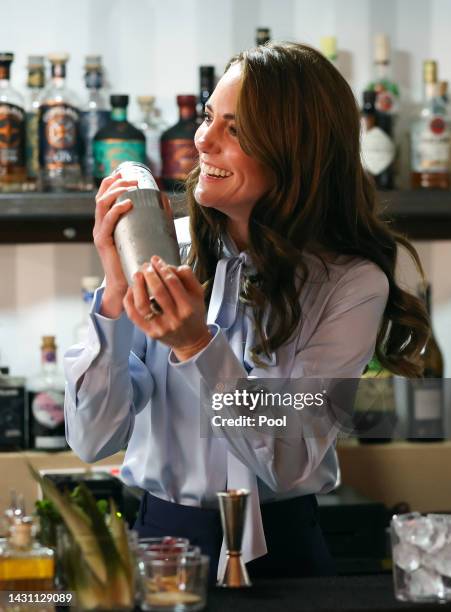 Catherine, Princess of Wales makes a cocktail as she visits the Trademarket outdoor market, as part of the royal visit to Northern Ireland on October...