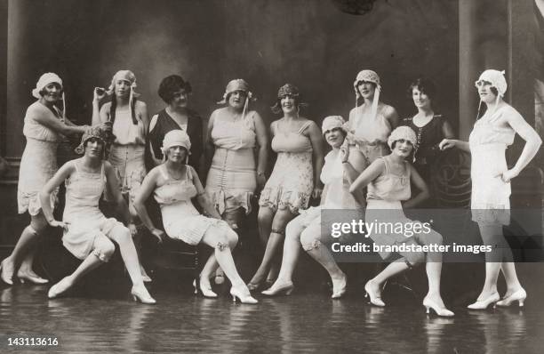 Brothel . Women in lingerie with 2 attendants. Photograph around 1925.
