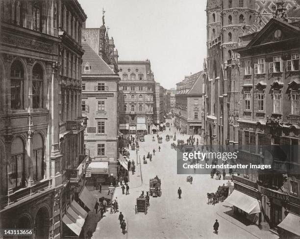 Stephansplatz. On the left the socalled "Haas-Haus", a department store. On the right St. Stephan's Cathedral. Photograph by C. Von Zamboni....