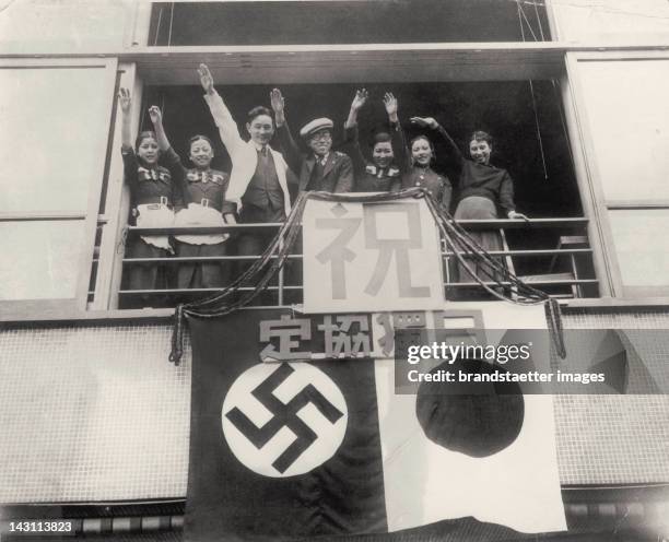 Group of young Japanese doing the Nazi salute . Japan. Photograph. Around 1935.