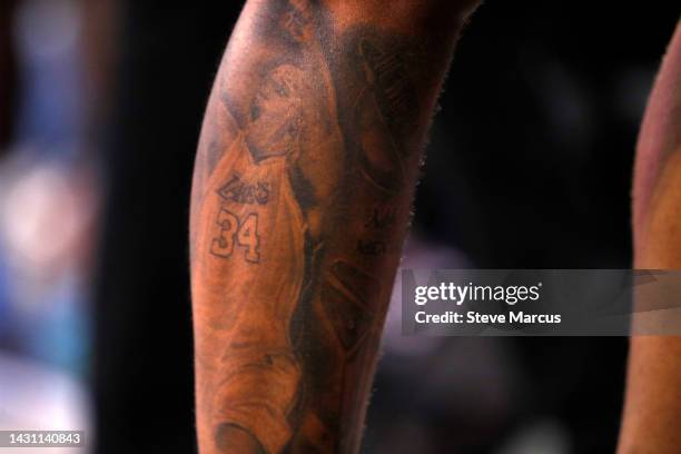 Tattoo on the leg of Shareef O'Neal of G League Ignite, depicting his father Shaquille O'Neal, is shown during an exhibition game at The Dollar Loan...