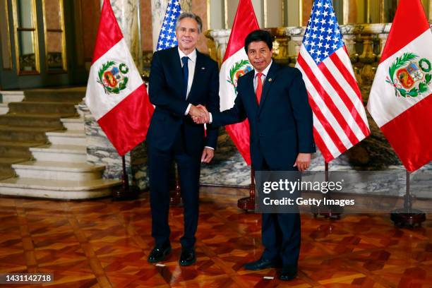 President of Peru Pedro Castillo shakes hands with US Secretary of State Antony Blinken during the 52nd General Assembly of Organization of American...
