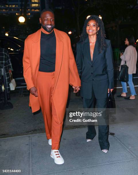 Dwyane Wade and Gabrielle Union arrive at a screening of 'The Redeem Team' on October 06, 2022 in New York City.