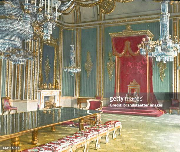The throne room in Buckingham Palace. London. England. United Kingdom. Hand-colored lantern slide around 1900.