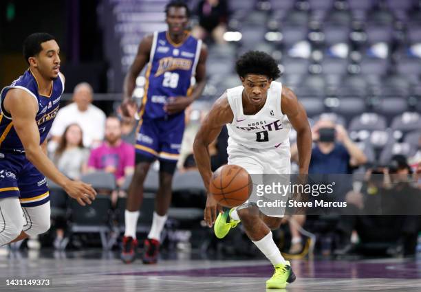 Scoot Henderson of G League Ignite chases after a loose ball during the first quarter of the exhibition game against Boulogne-Levallois Metropolitans...