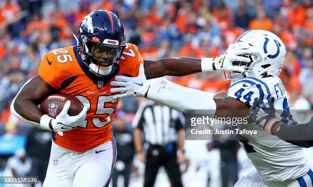 Melvin Gordon III of the Denver Broncos rushes during a game against the Indianapolis Colts at Empower Field At Mile High on October 06, 2022 in...