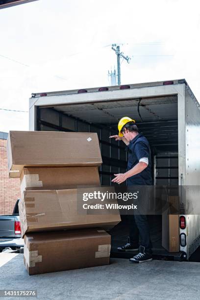 Fall Off Box 35 Box Falling Off Truck Stock Photos, High-Res Pictures, and Images ...